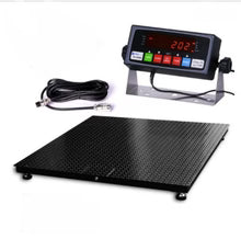 Industrial warehouse floor scale used for weighing a loaded pallet for shipping and compliance